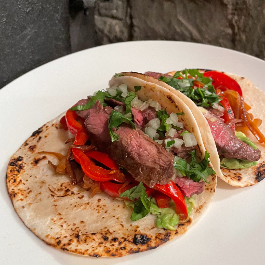 Carne Asada Tacos with Grilled Peppers and Onions